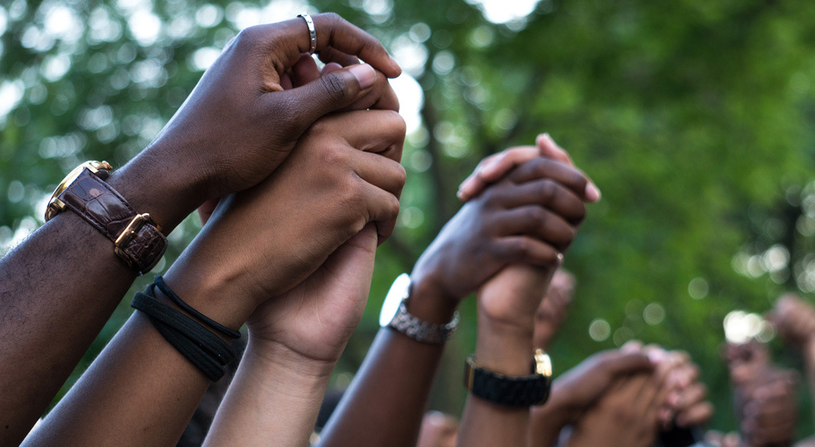 Arms raised black lives matter protest