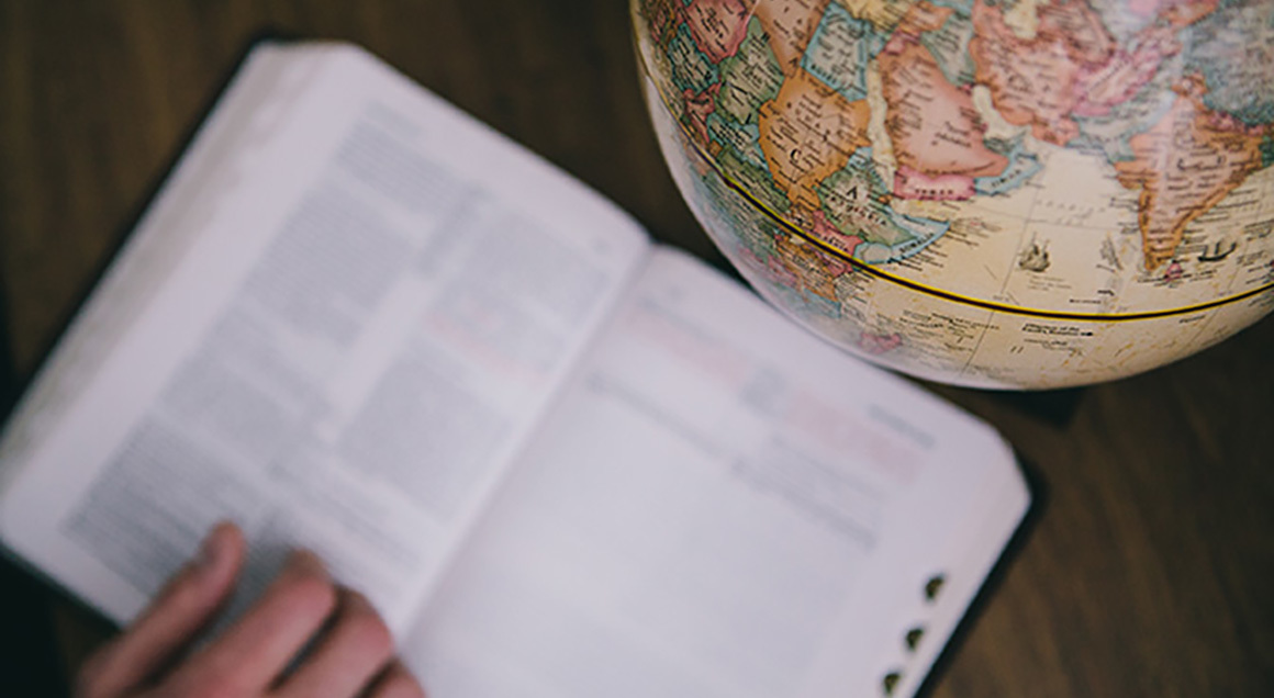 Bible and globe 1160x636