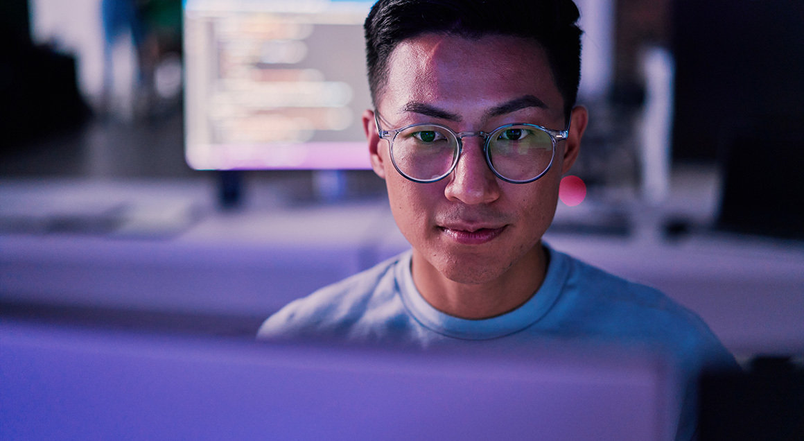 I S Asian Man On Computer