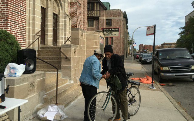 Praying with a bike rider 640 x400